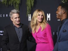 Dermot Mulroney, Julia Roberts and Stephan James arrive at the Los Angeles premiere of Homecoming (Danny Moloshok/Invision/AP)