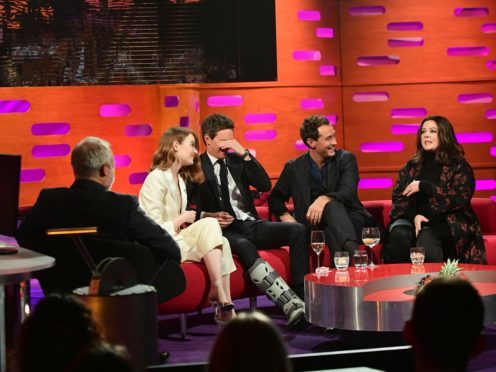 Eddie Redmayne wears leg brace on Graham Norton after film set ankle sprain (Ian West/PA)