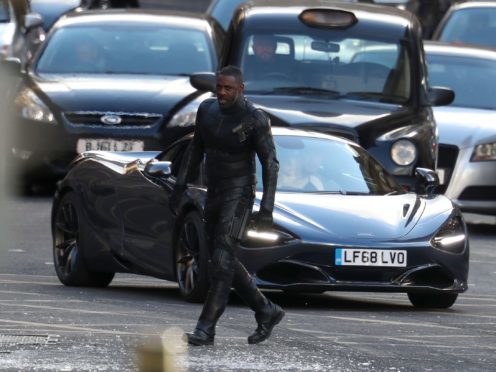 Actor Idris Elba during filming in Glasgow city centre for a new Fast and Furious movie (Andrew Milligan/PA)