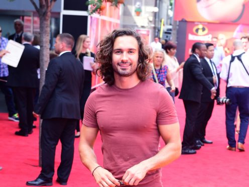 Personal trainer and TV star Joe Wicks is engaged to the mother of his child (Ian West/PA)