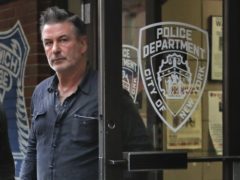 Actor Alec Baldwin walks out of the New York Police Department’s 10th Precinct (Julie Jacobson/AP)