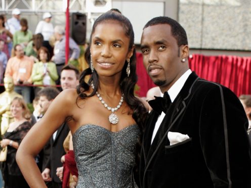 Sean “Diddy” Combs arrives with Kim Porter, for the 77th Academy Awards in Los Angeles (Amy Sancetta/AP)