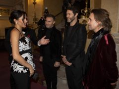 The Duchess of Sussex meeting Gary Barlow, Howard Donald and Mark Owen of Take That (Ian Vogler/Daily Mirror/PA)