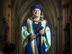 Eddie Izzard with his honorary degree from York St John University (Danny Lawson/PA)