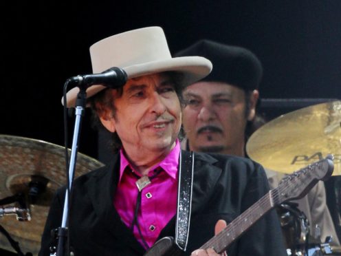 Bob Dylan will headline together with Neil Young (Gareth Fuller/PA)