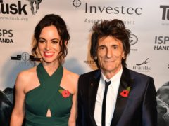 Ronnie Wood and his wife Sally Humphreys (John Stillwell/PA)
