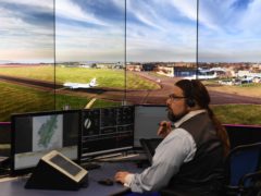 Air traffic controller Rafe Bickley in the new digital air traffic control tower at Cranfield Airport (Joe Giddens/PA)