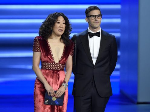 Sandra Oh and Andy Samberg present an award at the 70th Primetime Emmy Awards in Los Angeles (Chris Pizzello/Invision/AP)