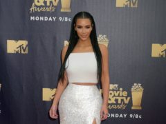Kim Kardashian West has confirmed she is expecting her fourth child with rapper husband Kanye West (Francis Specker/PA)