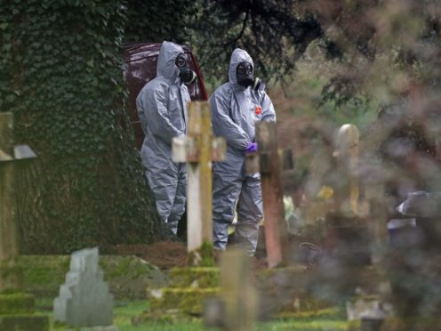 Forensic officers in gas masks in Salisbury (PA)
