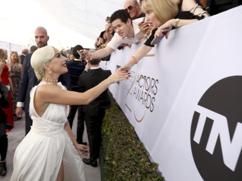 Lady Gaga interacts with fans at the 25th annual Screen Actors Guild Awards (Photo by Matt Sayles/Invision/AP)