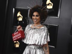 Joy Villa holds a purse that reads “Make America Great Again” at the 61st annual Grammy Awards at the Staples Center on Sunday, Feb. 10, 2019, in Los Angeles. (Photo by Jordan Strauss/Invision/AP)