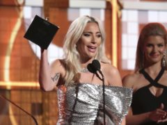 Lady Gaga reacts before accepting the award for best pop duo or group performance (Matt Sayles/Invision/AP)