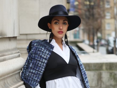 Fashionista Martina Gurgel wears Chanel and Topshop during the Autumn/Winter 2019 London Fashion Week outside Freemasons’ Hall, London.