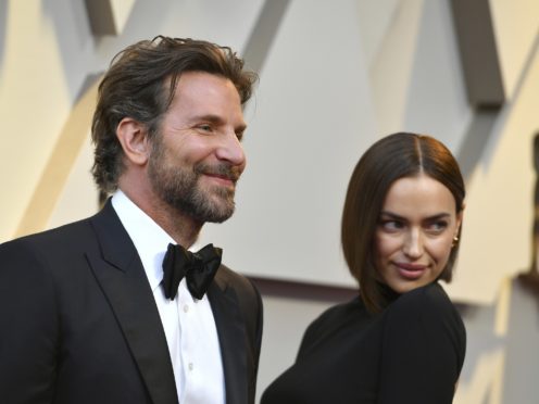 Bradley Cooper, left, and Irina Shayk arrive at the Oscars (Jordan Strauss/Invision/AP)