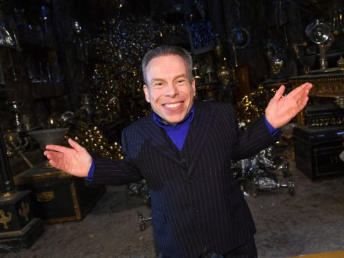 Warwick Davis has a ‘cherished’ memory of Alan Rickman and his daughter on the Harry Potter set (Douog Peters/PA)