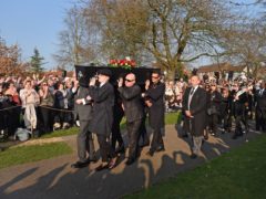 The coffin of Keith Flint is carried into St Mary’s Church in Bocking, Essex (Joe Giddens/PA)