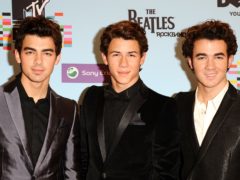 The Jonas Brothers will play Capital’s Summertime Ball in London in June (Ian West/PA)