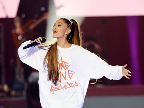 Ariana Grande has revealed the reason she was forced to postpone two concerts through illness was because of a tomato allergy (Dave Hogan for One Love Manchest/PA)