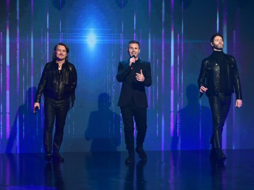 Take That’s current line-up is Gary Barlow, Mark Owen and Howard Donald (Ian West/PA)