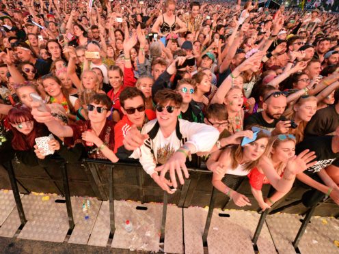 Fans at the Pyramid Stage in Glastonbury (Ben Birchall/PA)