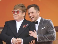 Singer Elton John and Taron Egerton (Photo by Arthur Mola/Invision/AP)