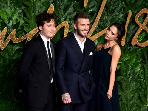 Brooklyn, David and Victoria Beckham (Ian West/PA)