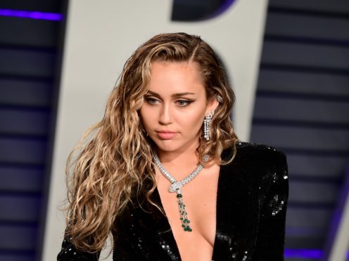 Miley Cyrus has addressed footage showing a fan grabbing her during an appearance in Spain (Ian West/PA)