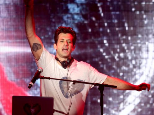 Mark Ronson: Fans won’t stop throwing Curly Wurly bars at me on stage (Isabel Infantes/PA)