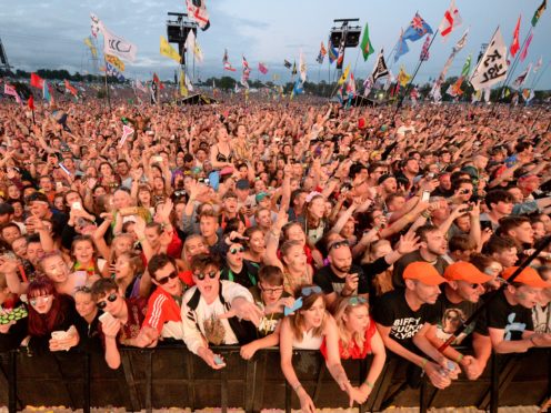 Glastonbury revellers could be in for mixed weather over the weekend (PA)