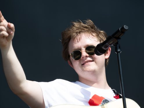 Lewis Capaldi entered the Glastonbury stage dressed as Noel Gallagher after the former Oasis star had criticised his music (Aaron Chown/PA)