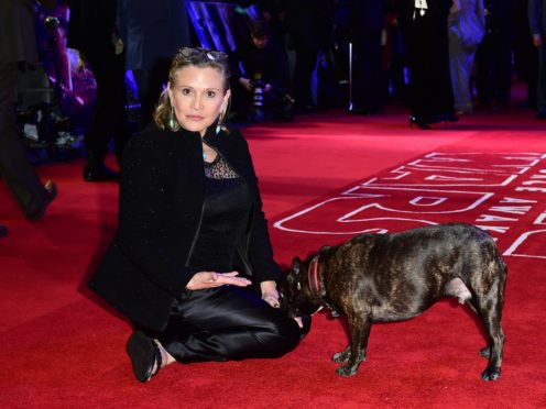 Carrie Fisher and dog Gary (Ian West/PA)