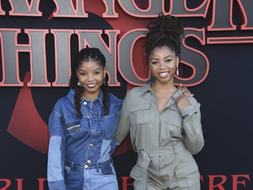 Halle Bailey, left, and Chloe Bailey, of Chloe X Halle, arrive at the season three premiere of Stranger Things (Jordan Strauss/Invision/AP)
