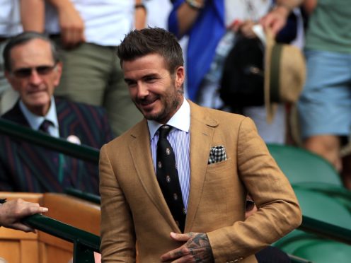 David Beckham in the royal box on day ten of the Wimbledon Championships at the All England Lawn Tennis and Croquet Club, Wimbledon.
