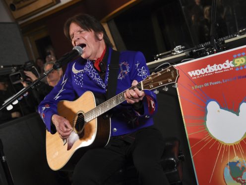 File photo of John Fogerty performing at the Woodstock 50 lineup announcement at Electric Lady Studios in New York (Evan Agostini/AP)