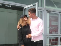 Love Island winners Amber Gill and Greg O’Shea arrive at Stansted Airport (Yui Mok/PA)