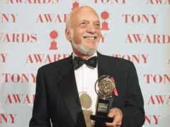 Harold Prince holds his 1995 Tony award for best director in a musical for Show Boat (Richard Drew/AP)