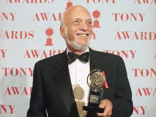 Harold Prince holds his 1995 Tony award for best director in a musical for Show Boat (Richard Drew/AP)