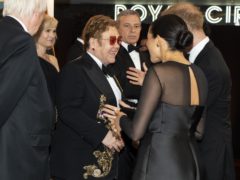 The Duke and Duchess of Sussex speak with Elton John (Niklas Halle’n/PA)