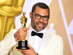 Jordan Peele with his Best Original Screenplay Oscar for Get Out (Ian West/PA)