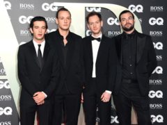 Matthew Healy, George Daniel, Adam Hann and Ross MacDonald of the band The 1975, who won a prize at the GQ awards (Matt Crossick/PA)