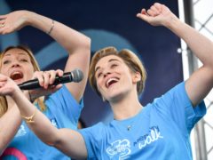 Line of Duty star Vicky McClure (right) on stage at the Alzheimer’s Society’s Nottingham Memory Walk alongside members of the BBC’s Our Dementia Choir (Jacob King/PA)