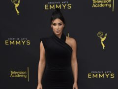 Kim Kardashian West said she wanted to help other sufferers as she opened up on her battle with the skin condition psoriasis (Jordan Strauss/Invision for the Television Academy/AP)