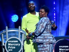 Dave hugs his mother after winning the Mercury Prize (Ian West/PA)