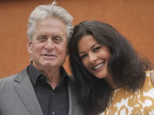 Catherine Zeta Jones and husband Michael Douglas (Ben Birchall/PA)