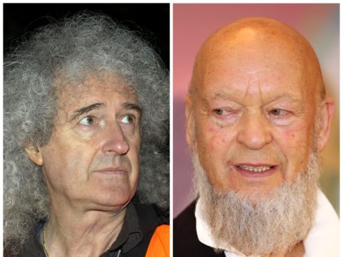 Brian May and Michael Eavis (PA)