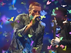 Chris Martin of Coldplay performs at Glastonbury (Ben Birchall/PA)