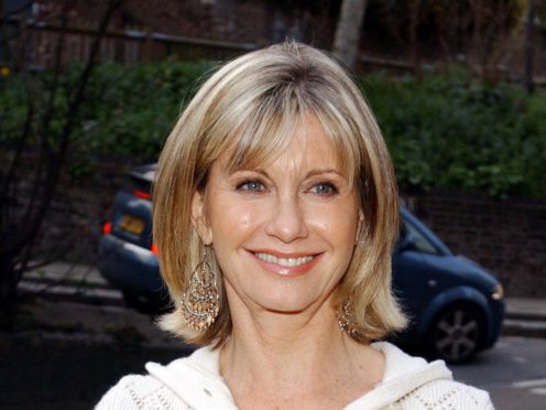 Olivia Newton-John has revealed she had no second thoughts about selling some of her most prized memorabilia for charity (Ian West/PA)