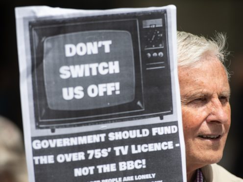 Demonstrators protest outside BBC Broadcasting House in Portland Place, London in protest over the corporation’s decision to means-test the TV licence for older people from June 2020 (Dominic Lipinski/PA)
