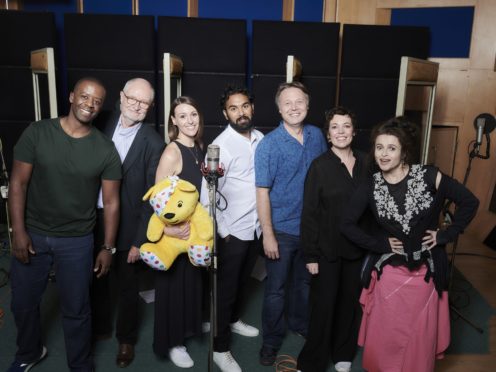 Adrian Lester, Jim Broadbent, Suranne Jones, Himesh Patel, Shaun Dooley, Olivia Colman and Helena Bonham Carter, who are all singing on an album of covers in aid of BBC Children In Need (BBC/Ray Burmiston)